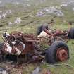 View of a destroyed vehicle which has been used as a target within the Cape Wrath Training Centre. The vehicles is one of eight situated within the fort (NC37SE 1) on Eilean nan Caorach.