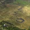 Oblique aerial view centred on the remains of the ironstone mine, taken from the NE.