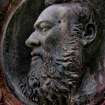 Detail of bronze portrait plaque on monument in memory of James Smith (died 1889).  Located in the front section of Grange Cemetery.