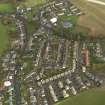 General oblique aerial view centred on the village, taken from the NW.