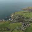 General oblique aerial view centred on the village, taken from the SE.