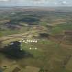 General oblique aerial view centred on the airfield, taken from the S.