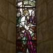 Interior. N wall stained glass window  by  Douglas Strachan. Detail