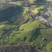 Oblique aerial view centred on the S section  of the explosives works, taken from the SE.