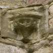 E end of chapter-house, detail of corbel in SE corner