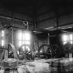 Interior view of Pumping Station being assembled with men working during the construction of Granton Gas works in 1901.