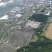 General oblique aerial view of Rosyth Europarc and HM Dockyard, taken from the ESE.