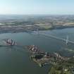 Oblique aerial view centred on the Forth Bridge with the Forth Road Bridge adjacent, taken from the NE.