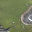 Oblique aerial view centred on the remains of the township, taken from the NE.