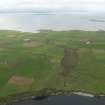 General oblique aerial view centred on the Blows Moss area of South Ronaldsay looking to Caithness, taken from the ENE.