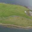 Oblique aerial view centred on the remains of a tramway, taken from the NW.