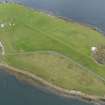 Oblique aerial view centred on the remains of a tramway, taken from the W.