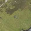 Oblique aerial view centred on the Port War Signal Station with the remains of the farmstead adjacent, taken from the NW.