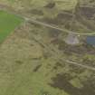 Oblique aerial view centred on the water system for the Port War Signal Station with the remains of the farmhouse adjacent, taken from the SW.