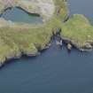 Oblique aerial view centred on the searchlight emplacements, taken from the SW.