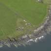 Oblique aerial view centred on the coastal gun battery, taken from the SE.