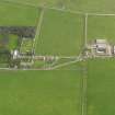 Oblique aerial view centred on the Country House with the Home Farm adjacent, taken from the NNW.
