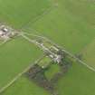 Oblique aerial view centred on the Country House with the Home Farm adjacent, taken from the E.