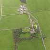 Oblique aerial view centred on the Country House with the Home Farm adjacent, taken from the ENE.