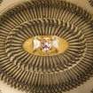 Interior. Ground floor, armoury, detail of display of flintlock pistols with Kennedy crest in centre