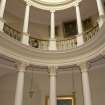 Interior. 1st floor, oval staircase, view of columns and cupola