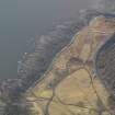 Oblique aerial view centred on the anti tank blocks, taken from the SW.