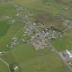 Oblique aerial view centred on the village, taken from the S.
