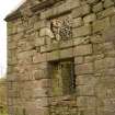 Detail of blocked doorway with window above at E end of N elevation at Dalton Old Parish Church