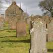 View looking E across graveyard to the W gabled elevation of Dalton Old Parish Church