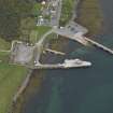 Oblique aerial view centred on the harbour  taken from the SE.