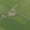 Oblique aerial view centred on the farmhouse with the farmstead adjacent, taken from the N.