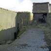 View of lower section with entrance to gun emplacement in the background from the N.