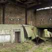 Detail of collapsed access bridge to rear of gun emplacement with tunnel to road.