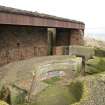 View acorss No.2 gun emplacement showing gun pit and later WW II canopy from S.