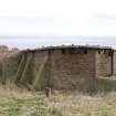 View of rear of No.1 gun emplacement showing later brickwork of WW II canopy.