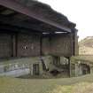 General view of gun emplacement, gun pit and later brick and concrete canopy, taken from the SSE.