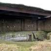 General view of gun emplacement, gun pit and later brick and concrete canopy, taken from the SE.