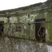 Detail in gun pit of iron rings to assist with block and tackle positioning of parts of the gun including the barrel during servicing.