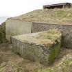 View of S blockhouse and ditch from SE.