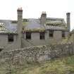 View of the rear of the cottages from the ESE.