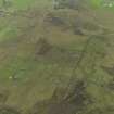 General oblique aerial view of the remains of the farmsteads around the Burn of Goustrie on Rousay, taken from the WSW.