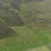 General oblique aerial view of the remains of the farmsteads around Kingarly on Rousay, taken from the E.