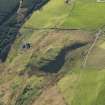 Oblique aerial view centred on the remains of the fort at Largiemore with the remains of the farmstead adjacent, taken from the N.