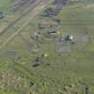 Oblique aerial view of the hangar at Machrihanish Airfield, taken from the SW.