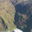 General oblique aerial view of the Innean Glen and the remains of the head dykes, rig, sheepfolds and buildings, taken from the W.