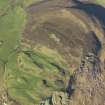 Oblique aerial view of The Bastard, dun, taken from the SE.