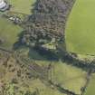 General oblique aerial view centred on the remains of the enclosure, taken from the NNW.