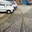Detail of extant tram tracks in setts at W end of depot.