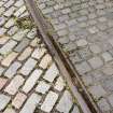 Detail of a section of tram track at W end of depot.