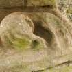 SE Corner buttress. Carved fragment. Detail